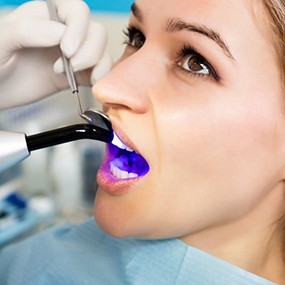 Patient receiving dental bonding